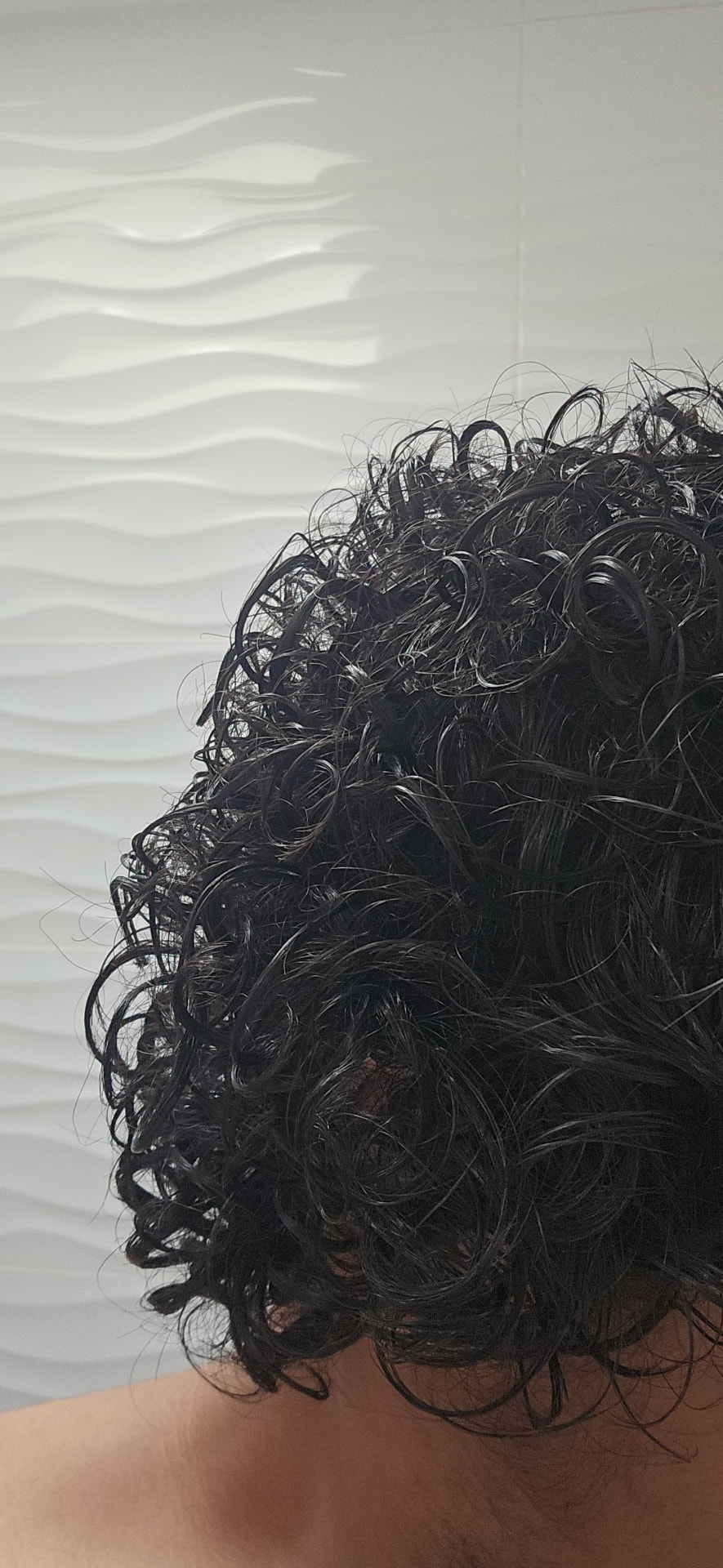 Second view of Elias's defined curls after using the Curl Nourishing Oil