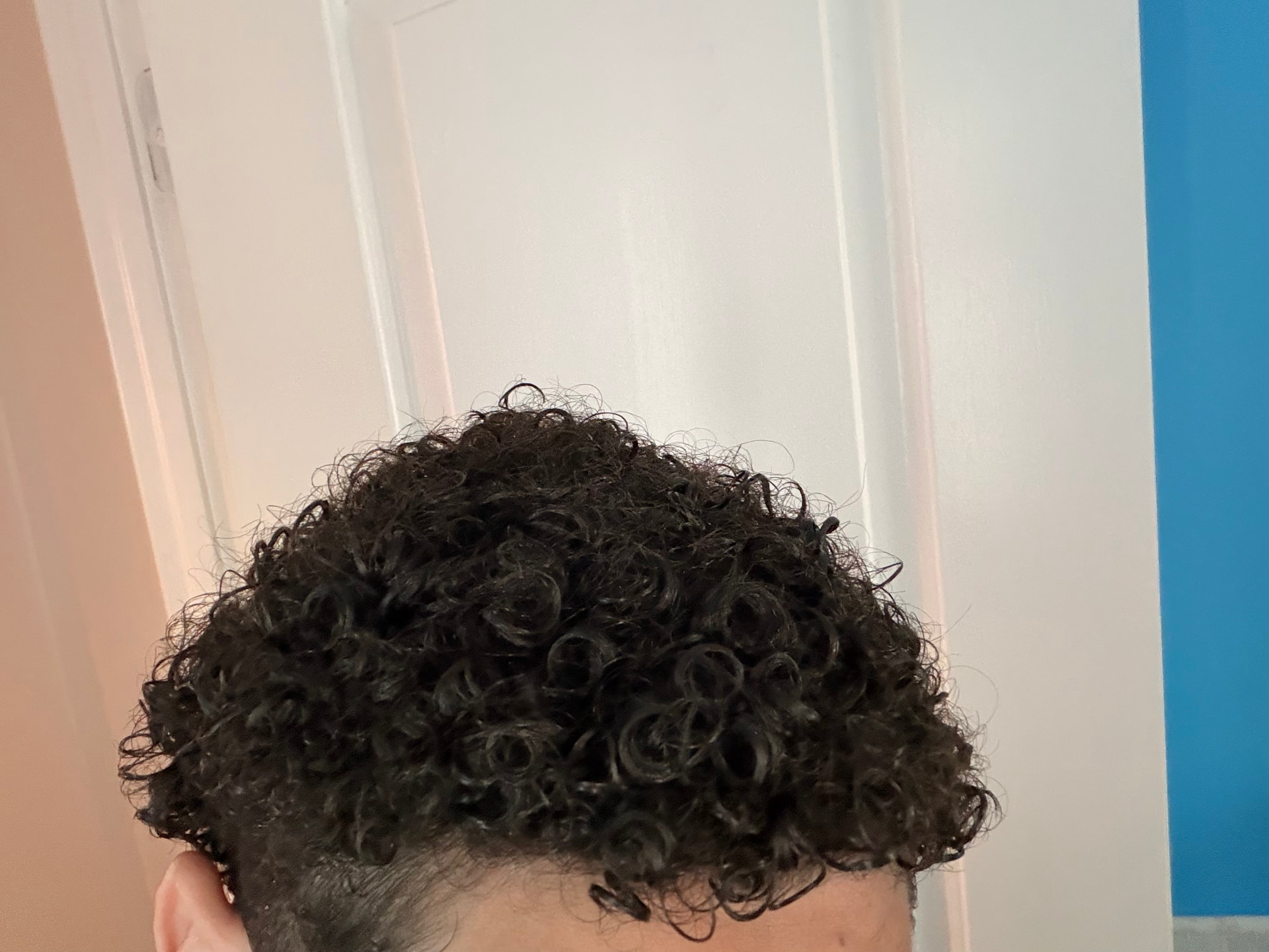 Close-up of Samy's soft, fresh curls after use