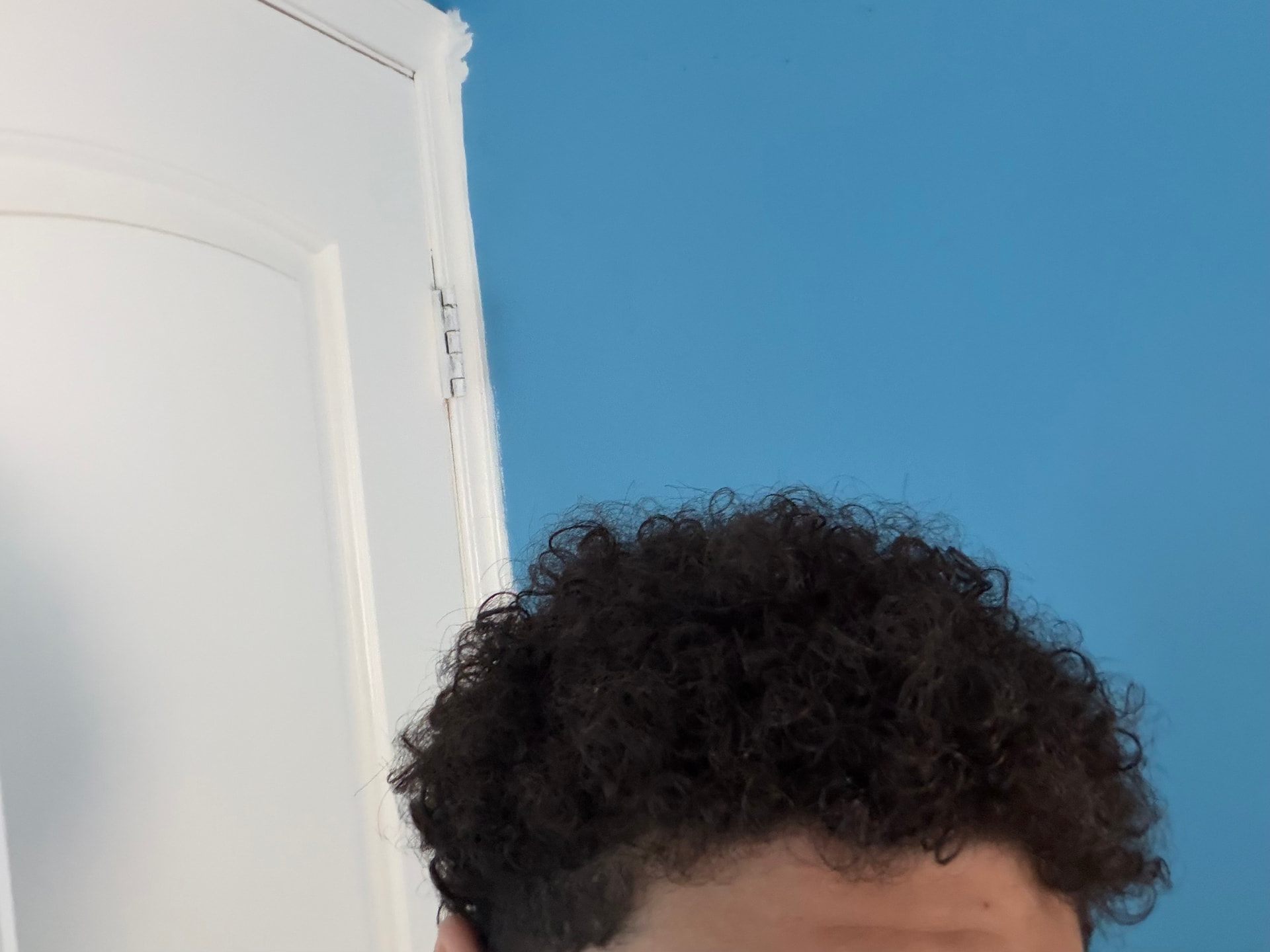 Samy's curls before using the Curl Nourishing Oil